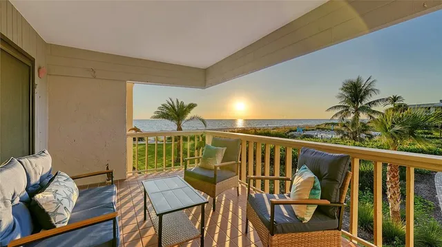 a view of a yard and ocean view