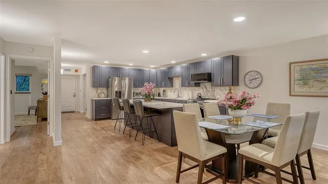 a bed room with a bed and a dresser