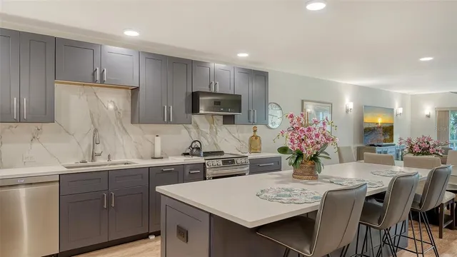 a bedroom with a bed and a tv on table