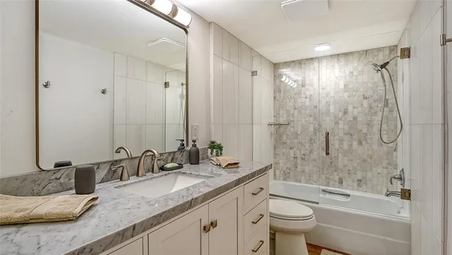 a view of a swimming pool with a lounge chair