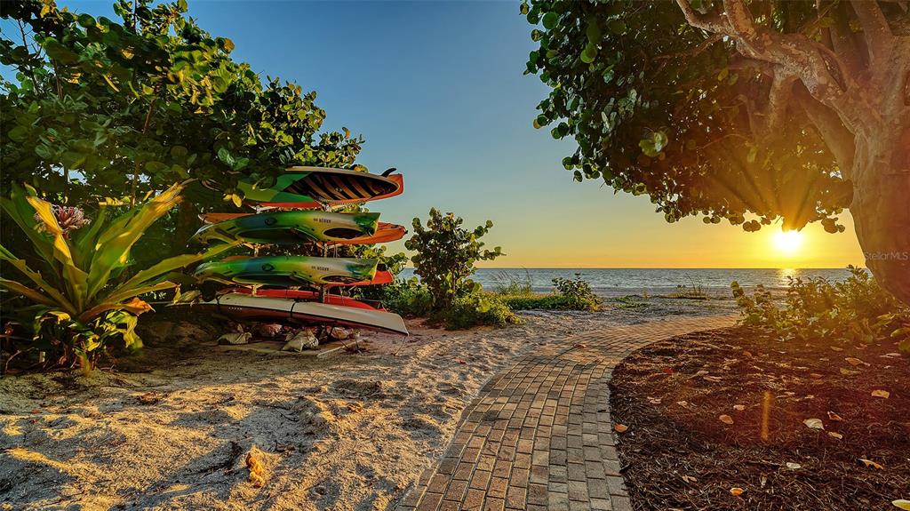 5757 Gulf Of Mexico Drive, Unit 204 Longboat Key, FL 34228 - Photo 53 of 71 a view of a pathway with a yard