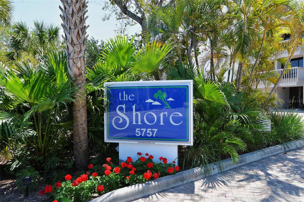 5757 Gulf Of Mexico Drive, Unit 204 Longboat Key, FL 34228 - Photo 57 of 71 a sign that is on a pole