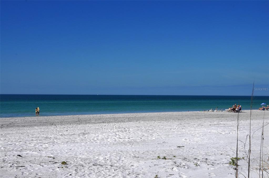 5757 Gulf Of Mexico Drive, Unit 204 Longboat Key, FL 34228 - Photo 70 of 71 a view of a room with a wooden fence