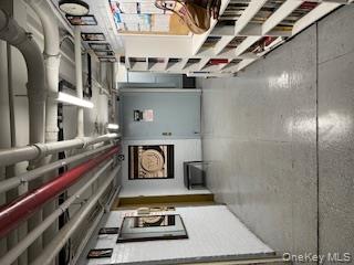 390 Riverside Drive, Unit 12AC Manhattan, NY 10025 - Photo 21 of 29 Unfinished below grade area with brick wall