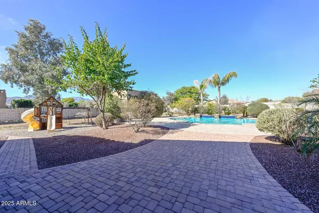 a view of a hall with a fireplace