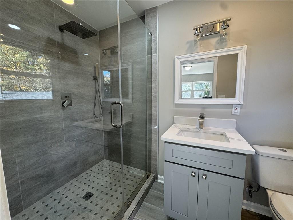 3489 Creighton Road Southwest Atlanta, GA 30331 - Photo 32 of 53 a bathroom with a sink toilet and shower