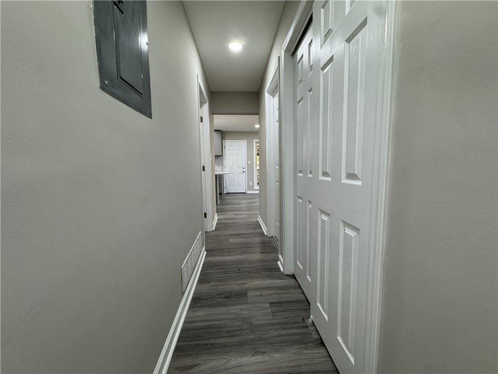3489 Creighton Road Southwest Atlanta, GA 30331 - Photo 36 of 53 a view of a hallway with wooden floor and staircase