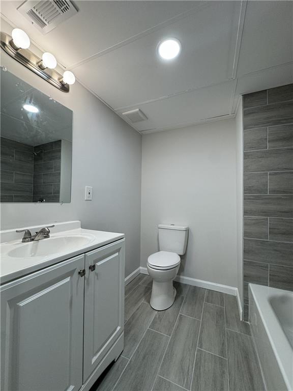 3489 Creighton Road Southwest Atlanta, GA 30331 - Photo 47 of 53 a bathroom with a sink a toilet and a mirror