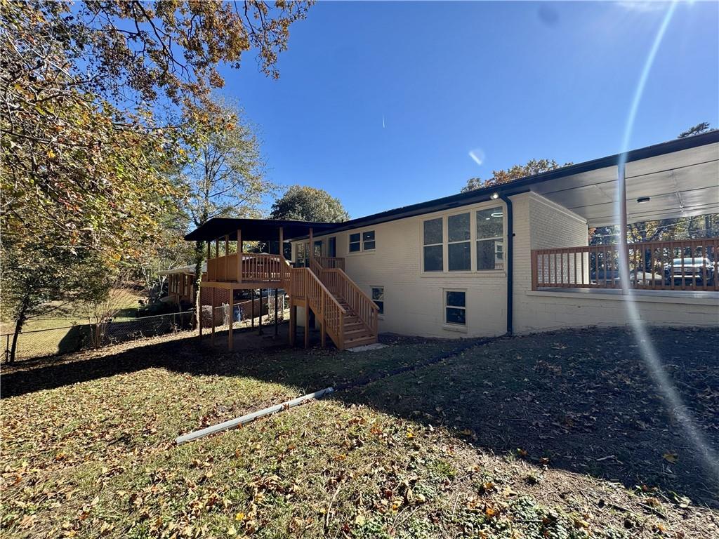 3489 Creighton Road Southwest Atlanta, GA 30331 - Photo 52 of 53 a view of a house with a yard