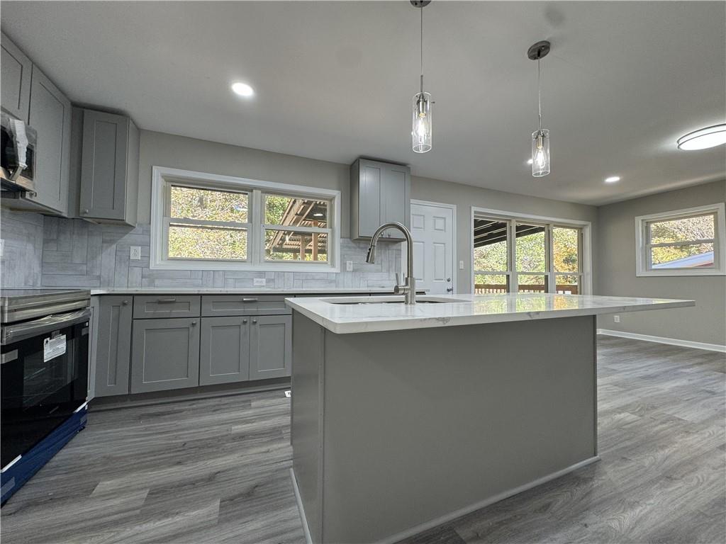 3489 Creighton Road Southwest Atlanta, GA 30331 - Photo 10 of 53 a kitchen with counter top space sink and appliances