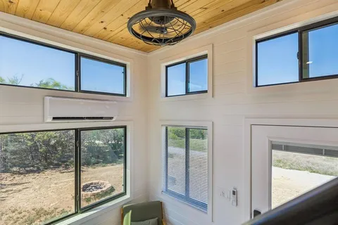 a view of a door and a window