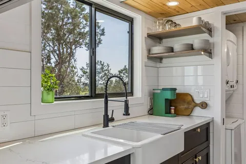 a bathroom with a sink and mirror