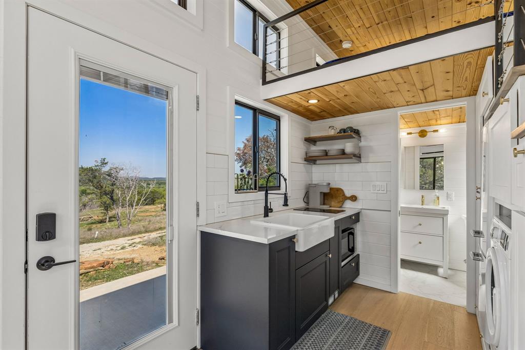 122 Western Sky Drive Ranger, TX 76470 - Photo 28 of 40 a bathroom with a sink a mirror and a shower