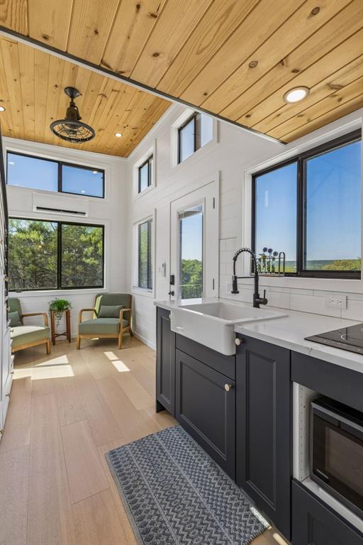 122 Western Sky Drive Ranger, TX 76470 - Photo 30 of 40 a kitchen with a sink stove and cabinets