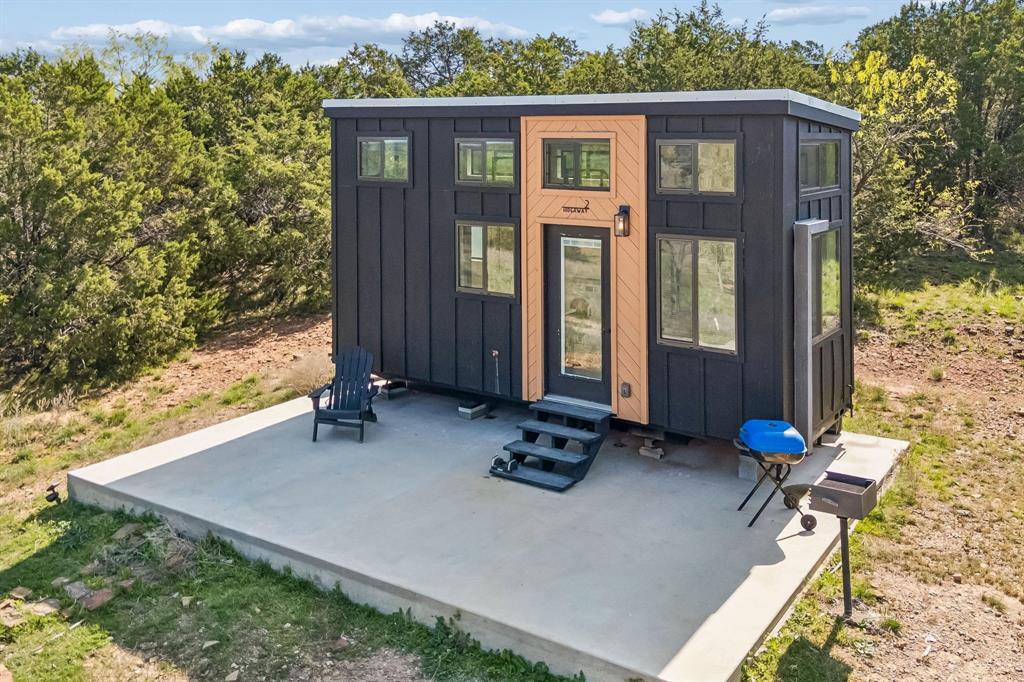 122 Western Sky Drive Ranger, TX 76470 - Photo 36 of 40 an outdoor view of house with backyard