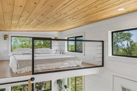 a view of a room with a large window