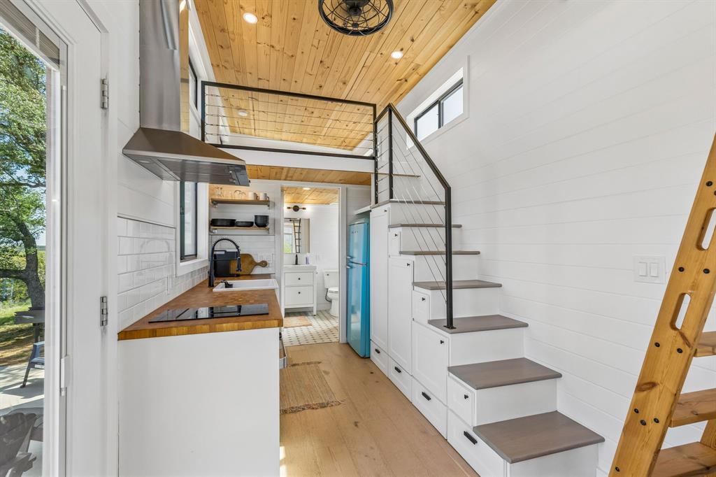 122 Western Sky Drive Ranger, TX 76470 - Photo 6 of 40 a view of entryway and hall with wooden floor