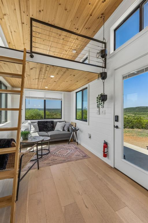 122 Western Sky Drive Ranger, TX 76470 - Photo 7 of 40 a view of a patio with a table and chairs under an umbrella