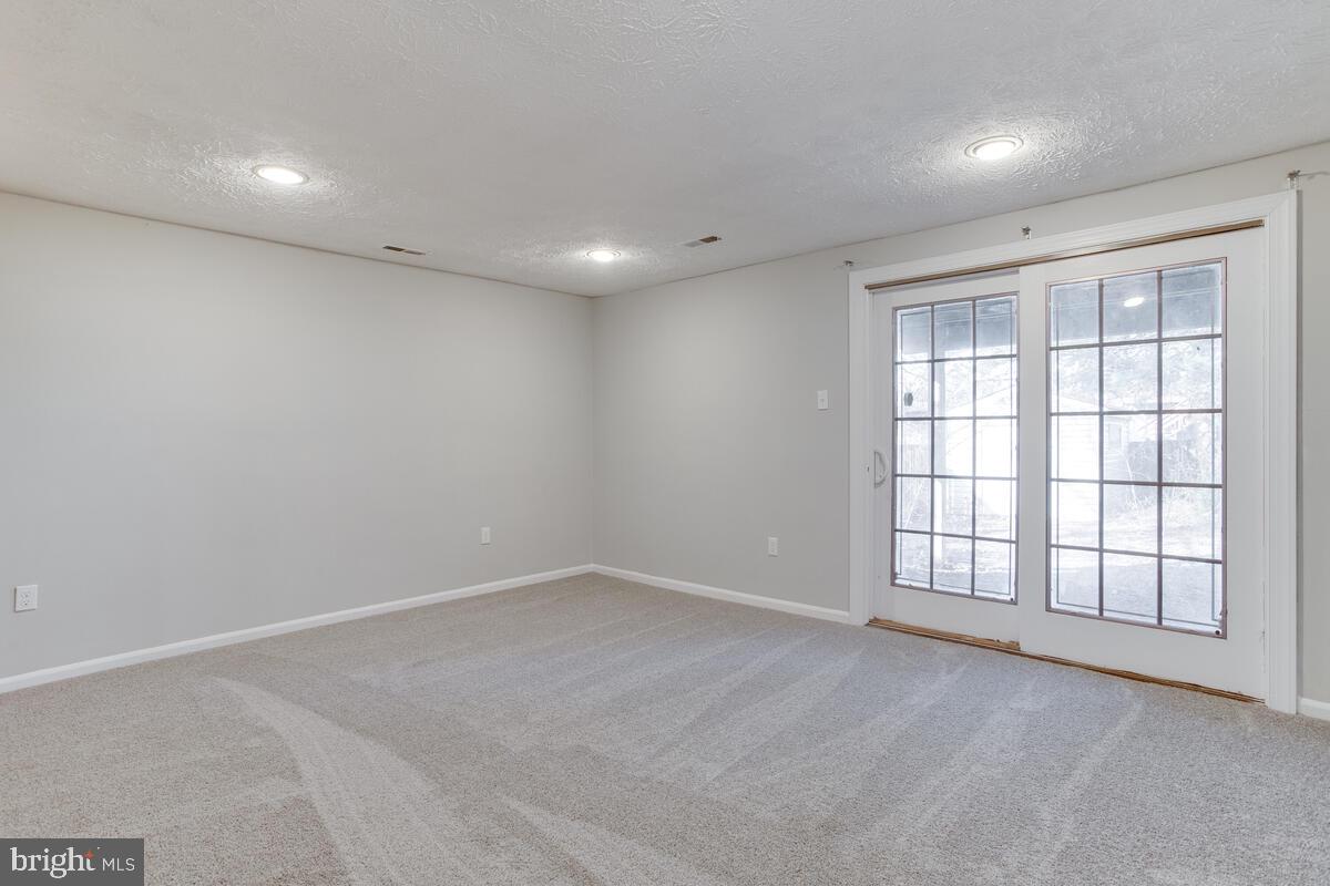 1308 Apple Ridge Court Edgewood, MD 21040 - Photo 28 of 38 an empty room with windows