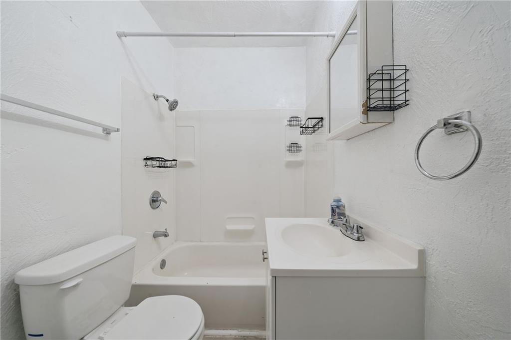 545 Sixth Street Trafford, PA 15085 - Photo 11 of 11 a bathroom with a sink toilet and shower