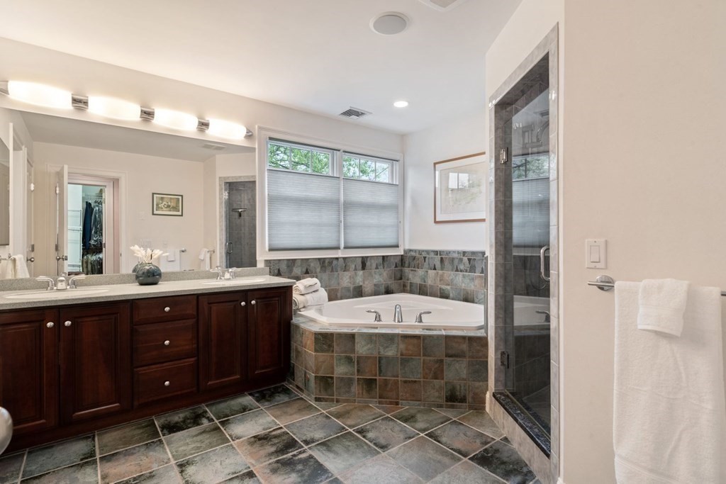 94 Cynthia Road Needham, MA 02494 - Photo 19 of 39 a bathroom with a sink and a mirror