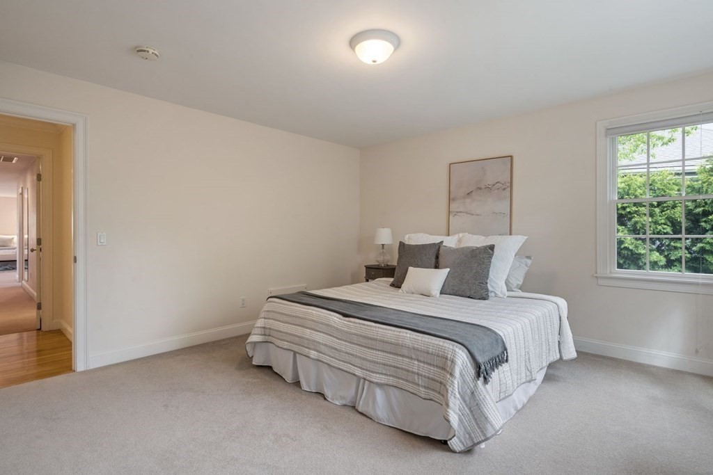 94 Cynthia Road Needham, MA 02494 - Photo 25 of 39 a bedroom with a bed and a window