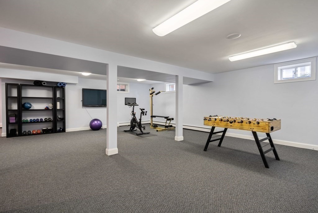 94 Cynthia Road Needham, MA 02494 - Photo 33 of 39 a view of a room with gym equipment