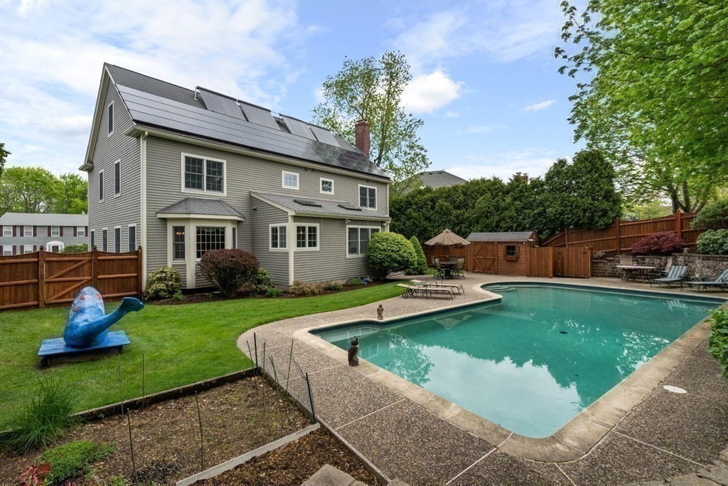94 Cynthia Road Needham, MA 02494 - Photo 36 of 39 a front view of a house with garden