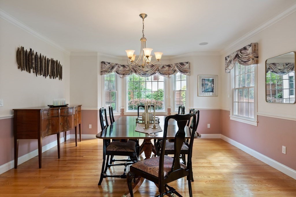 94 Cynthia Road Needham, MA 02494 - Photo 8 of 39 a view of a dining room with furniture window and wooden floor