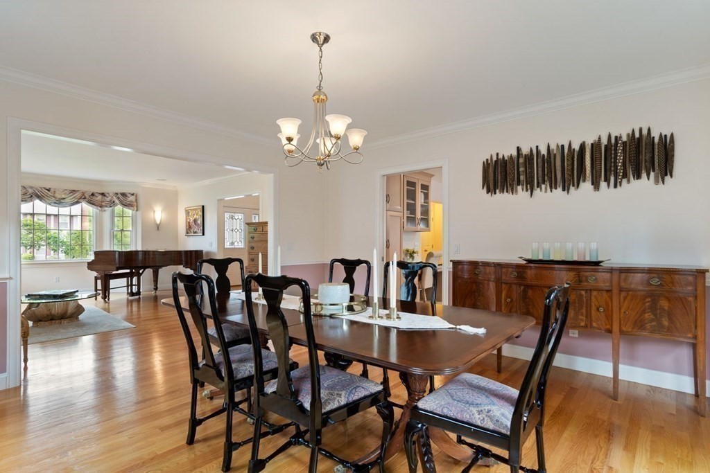 94 Cynthia Road Needham, MA 02494 - Photo 9 of 39 a view of a dining room with furniture