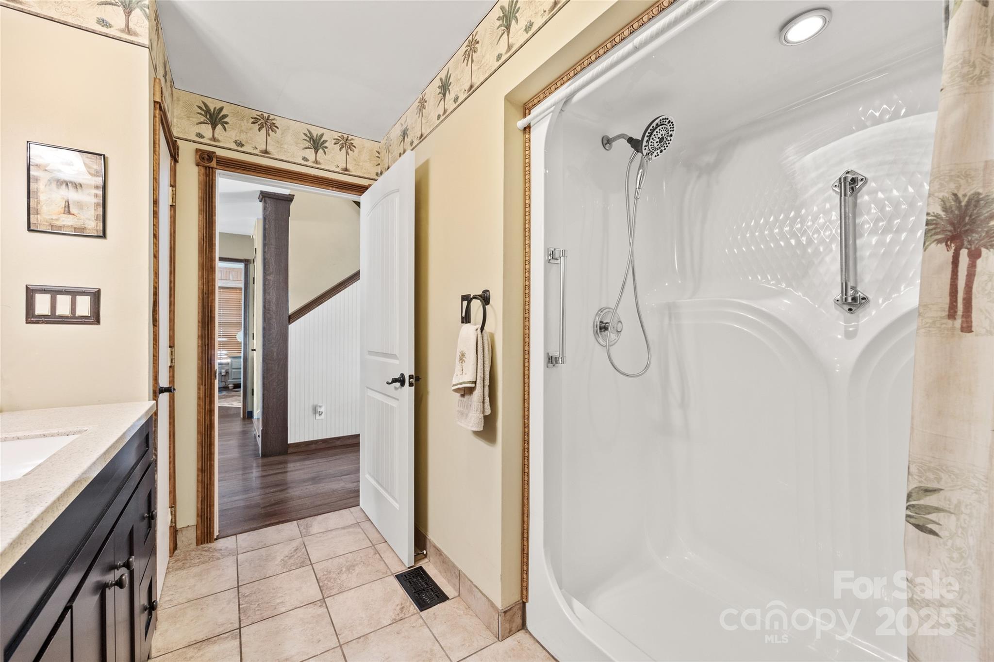 27056 Catamaran Drive Tega Cay, SC 29708 - Photo 15 of 48 a bathroom with a tub shower and a sink