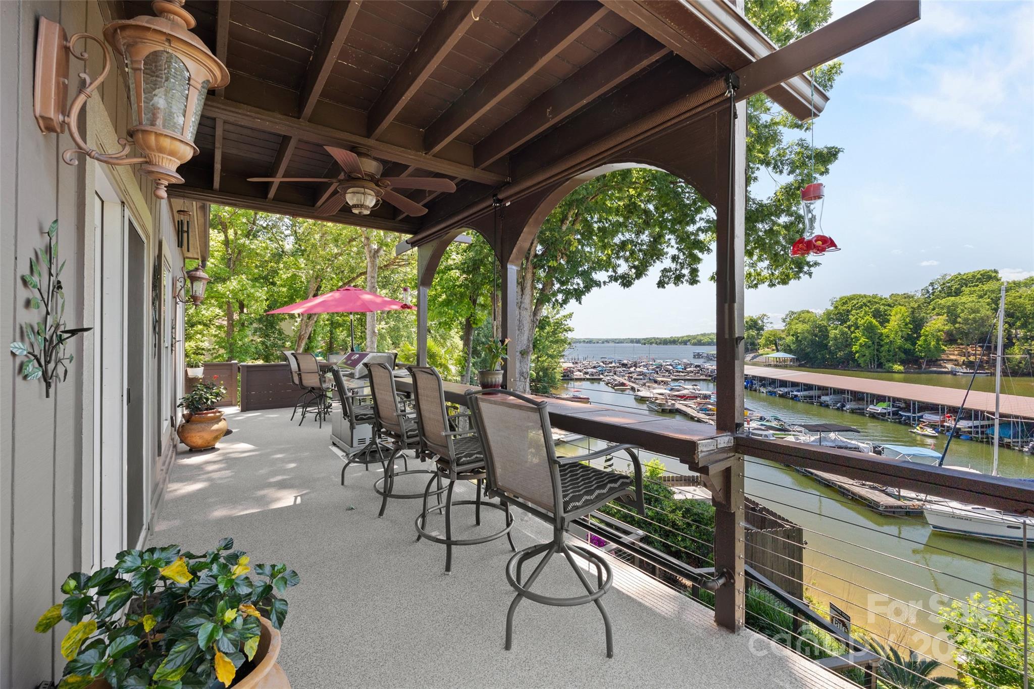 27056 Catamaran Drive Tega Cay, SC 29708 - Photo 33 of 48 a view of a chairs and table in the balcony