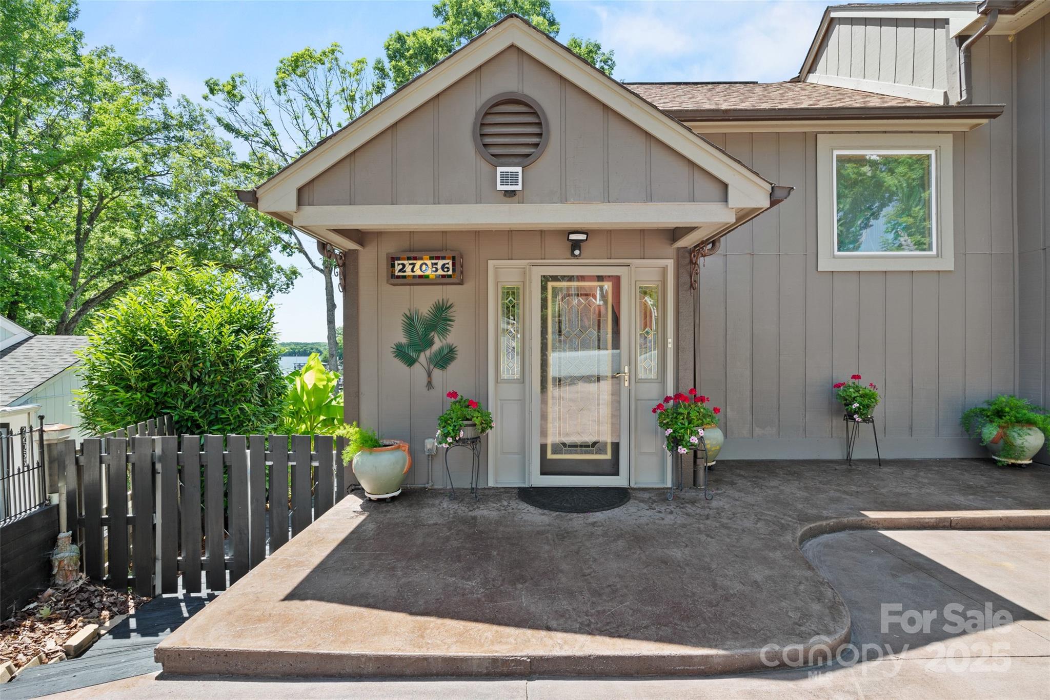 27056 Catamaran Drive Tega Cay, SC 29708 - Photo 40 of 48 a front view of a house with a porch