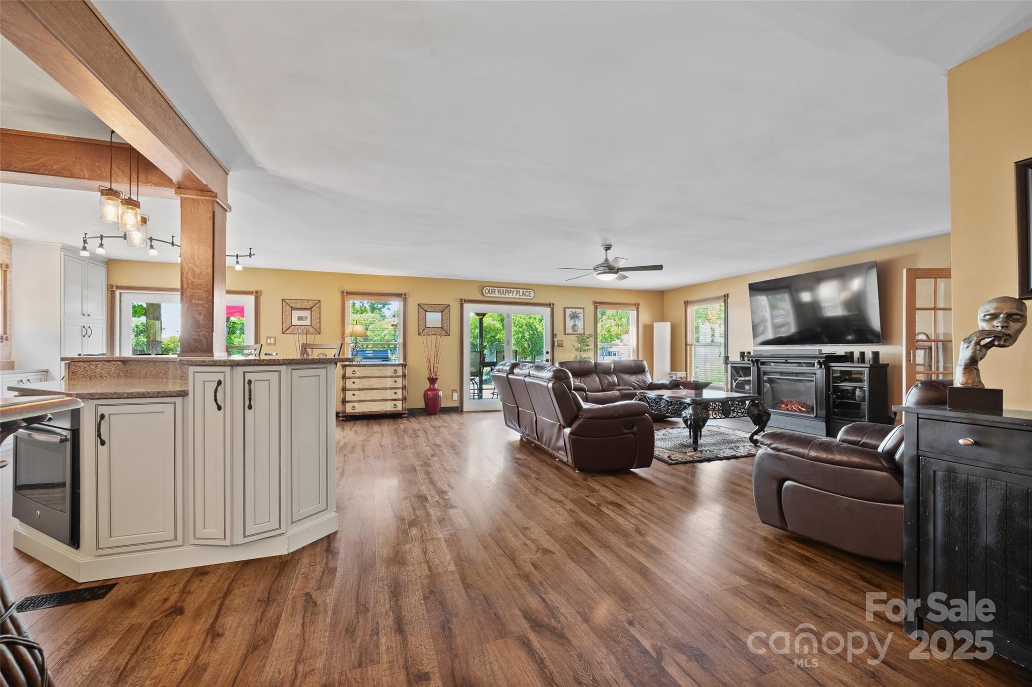 27056 Catamaran Drive Tega Cay, SC 29708 - Photo 9 of 48 a living room with furniture and a flat screen tv