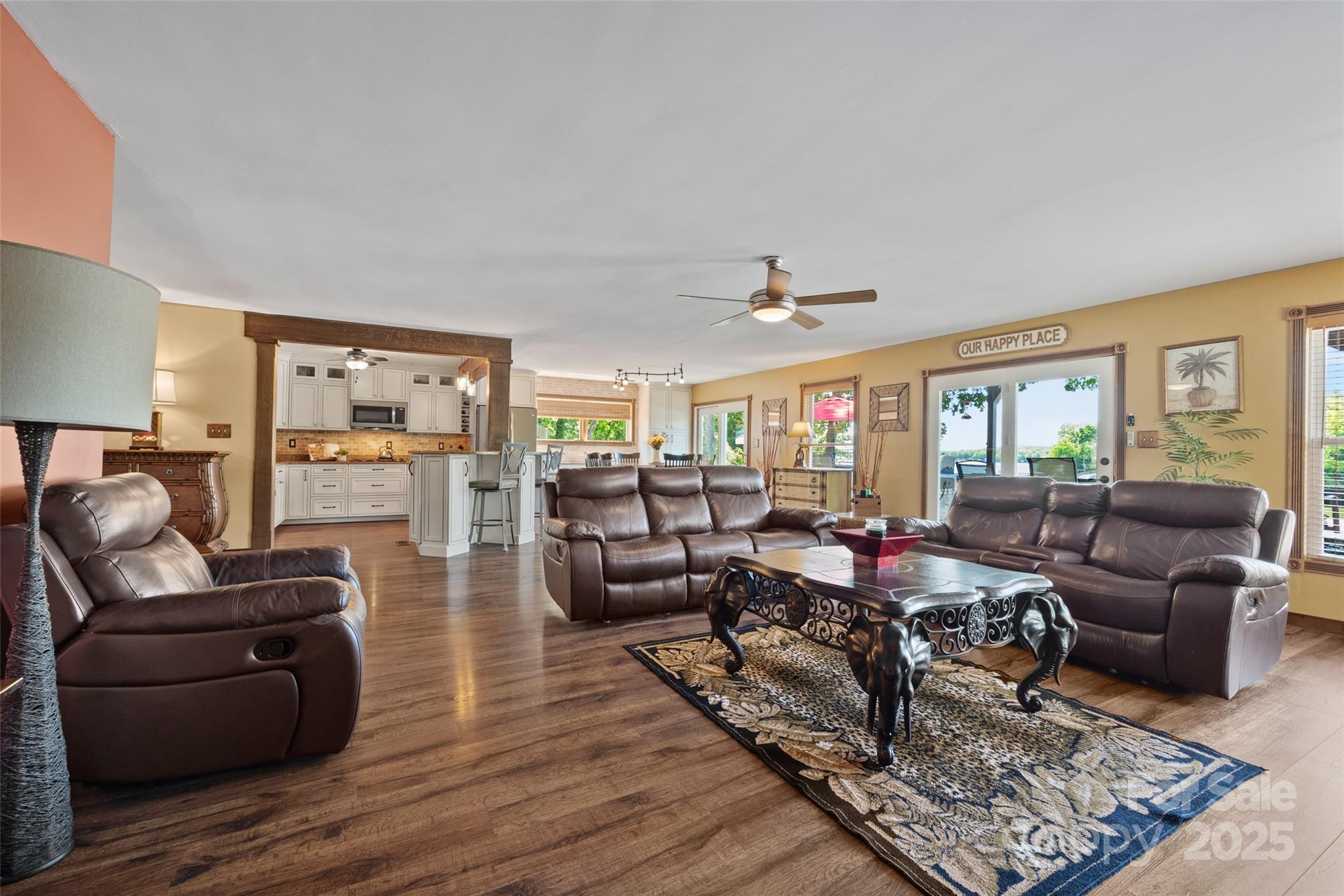 27056 Catamaran Drive Tega Cay, SC 29708 - Photo 10 of 48 a living room with furniture and wooden floor
