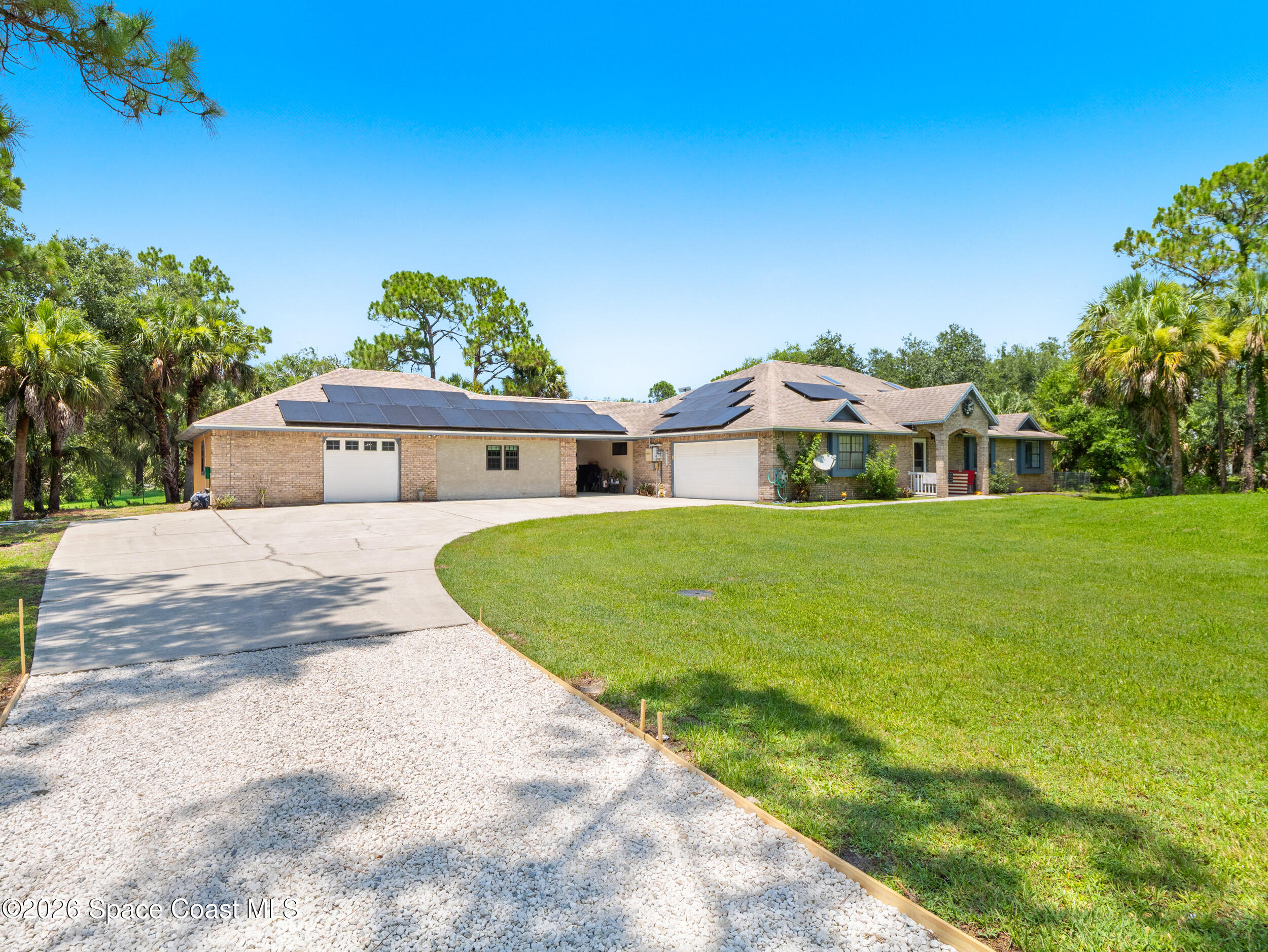 1950 Grant Road Grant Valkaria, FL 32949 - Photo 3 of 42 Driveway 2
