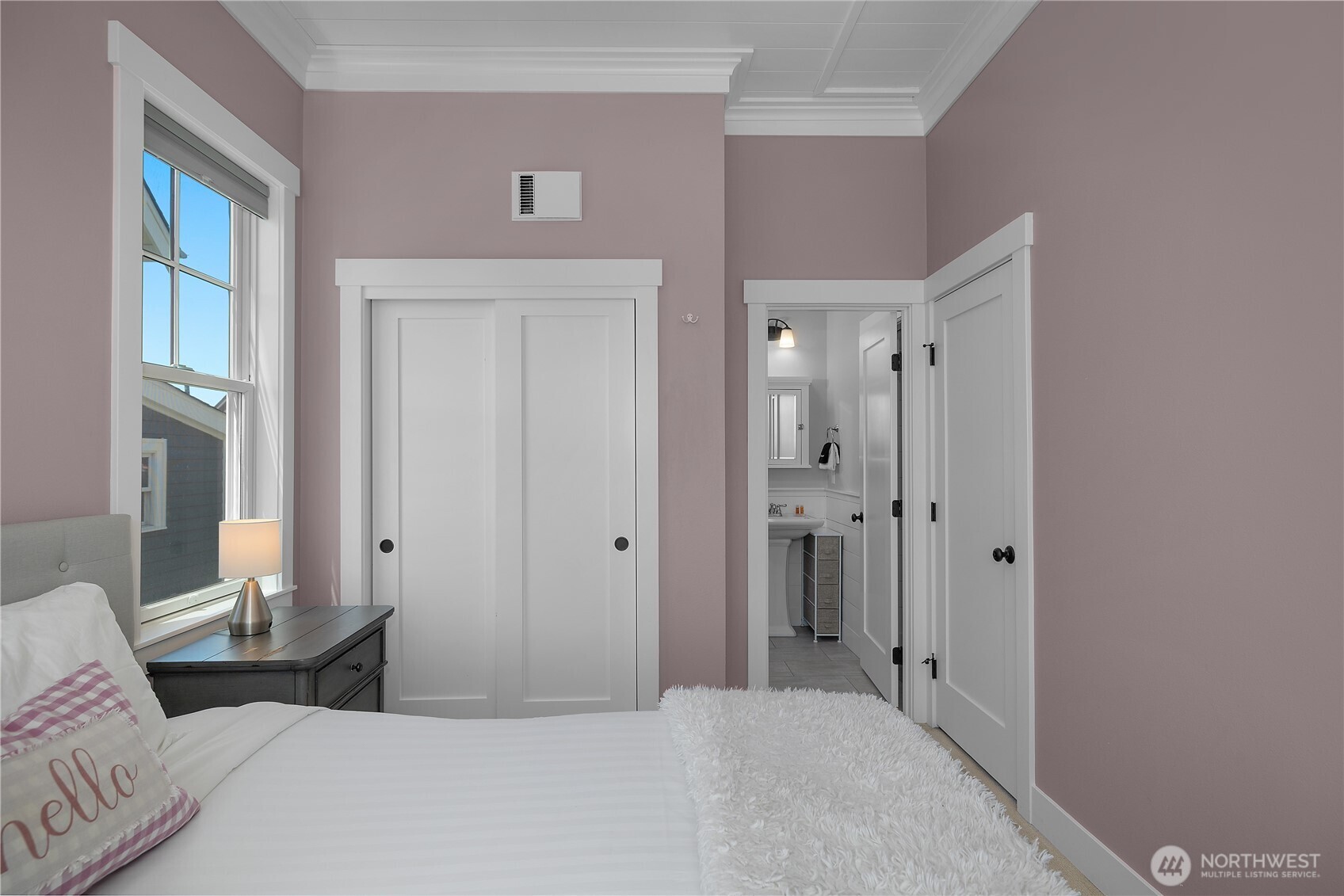 61 Horizon Street Pacific Beach, WA 98571 - Photo 12 of 29 a bedroom with a bed and a mirror