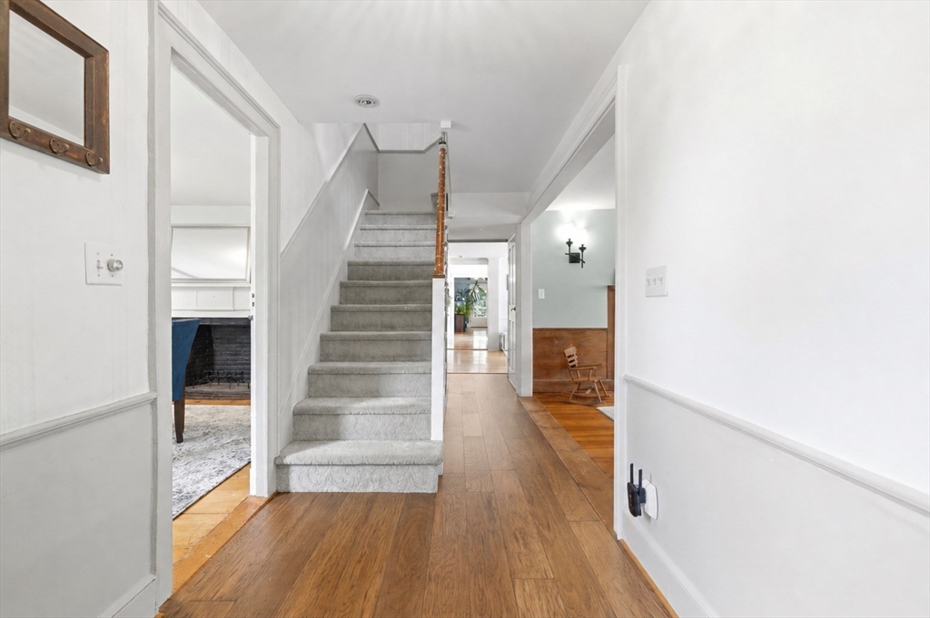 22 Stinson Road Andover, MA 01810 - Photo 24 of 40 a view of entryway and hall with wooden floor