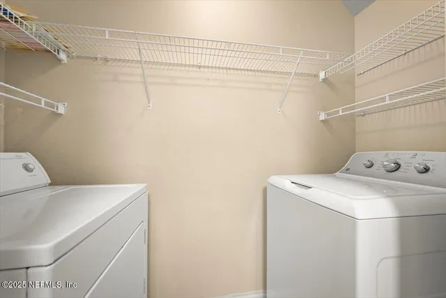 an empty room with a ceiling fan and a window