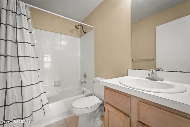 a view of a small yard from a balcony