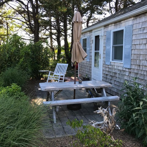 125 Shore Road, Unit 1 Truro, MA 02666 - Photo 8 of 8 a view of a backyard with sitting area