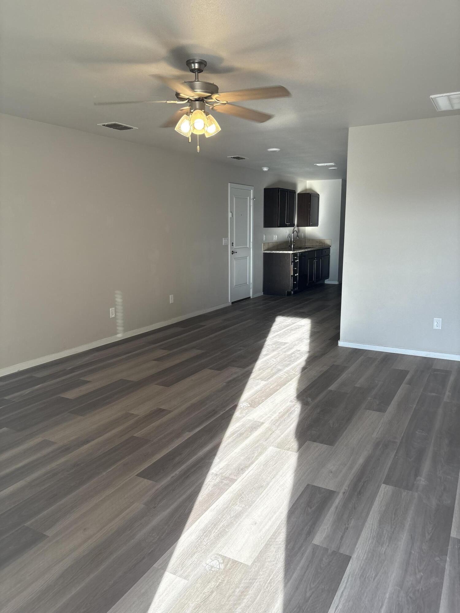 13809 Paris Lubbock, TX 79423 - Photo 17 of 19 wooden floor in an empty room with a mirror