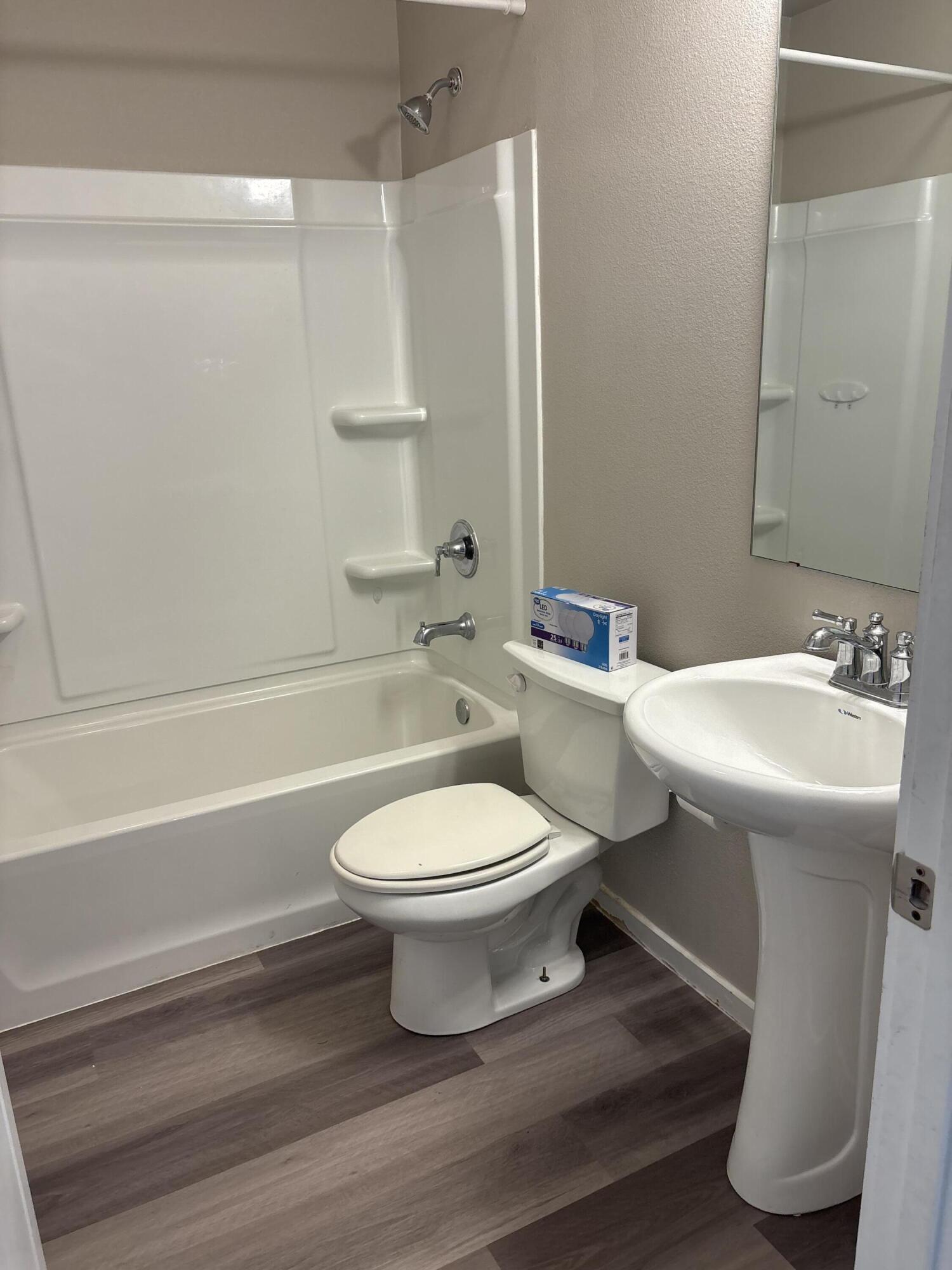 13809 Paris Lubbock, TX 79423 - Photo 8 of 19 a bathroom with a sink toilet and shower