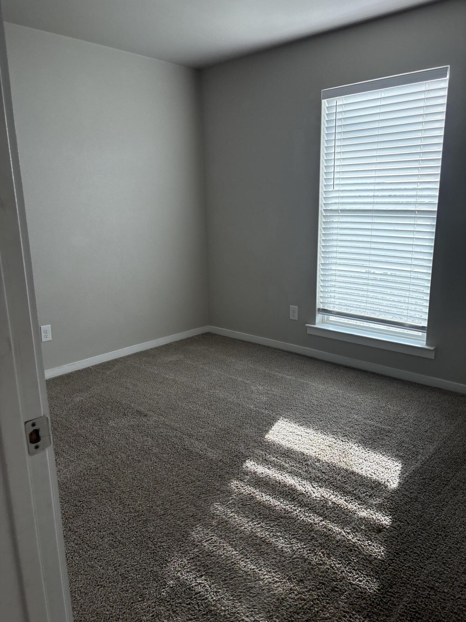 13809 Paris Lubbock, TX 79423 - Photo 10 of 19 a view of a room with a window
