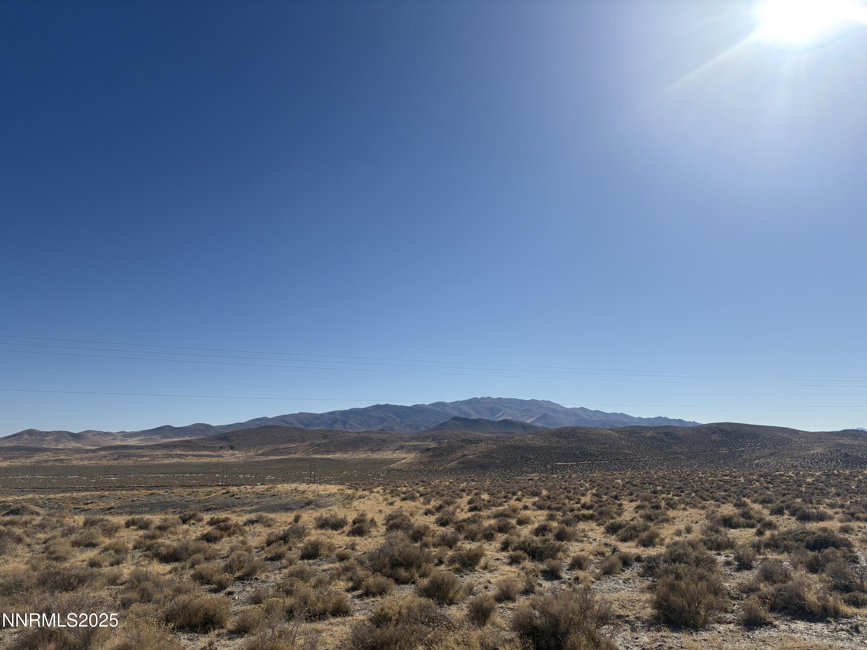 5-0331-33 Jungo Road Winnemucca, NV 89445 - Photo 9 of 11 a view of an mountain range with a lake