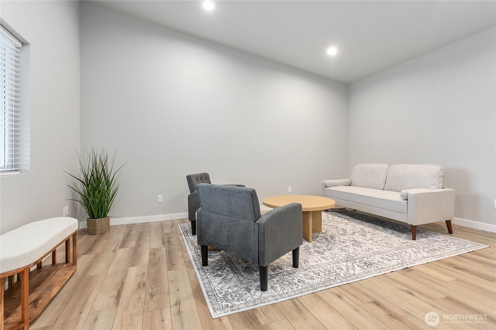 316 Everson Road, Unit D Everson, WA 98247 - Photo 18 of 38 a living room with furniture and a rug