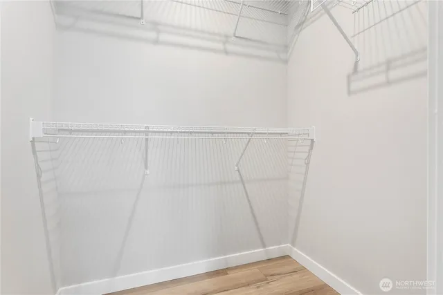 a view of an empty walk in closet