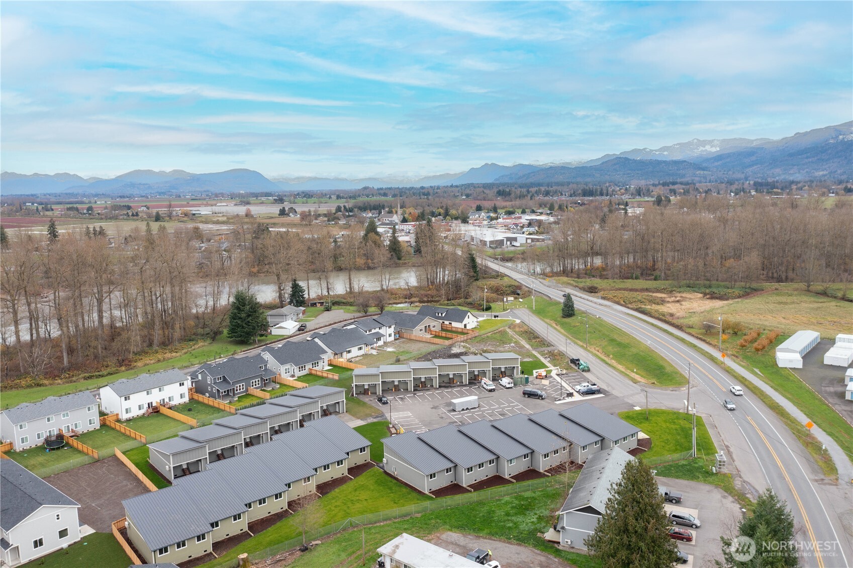 316 Everson Road, Unit D Everson, WA 98247 - Photo 9 of 38 a view of a city with a lake view