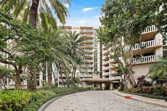 a front view of a building with garden