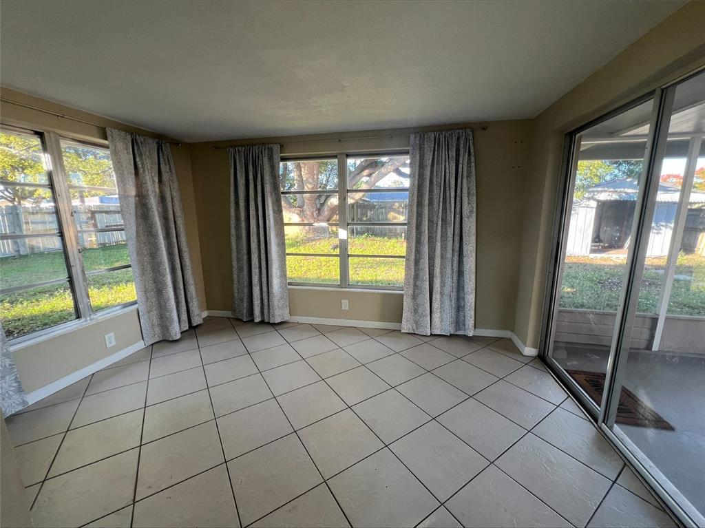 7539 Marechal Avenue Port Richey, FL 34668 - Photo 2 of 13 a view of a room with window